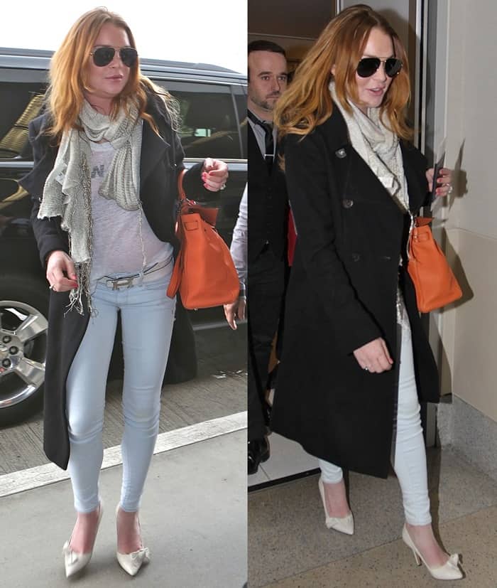 Lindsay Lohan wore a black coat, a scarf, a gray top, aviators, Isabel Marant “Poppy” pumps, and an orange Hermes bag