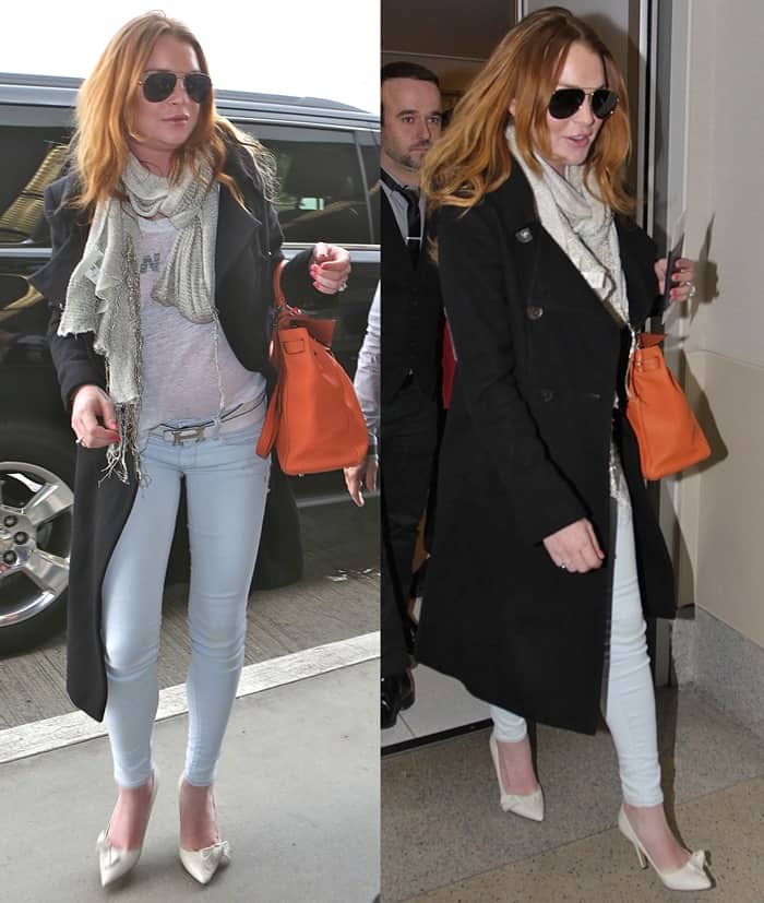 Lindsay Lohan showcases her casual chic style at LAX, pairing light-wash skinny jeans with a black coat, a cozy scarf, and white pumps