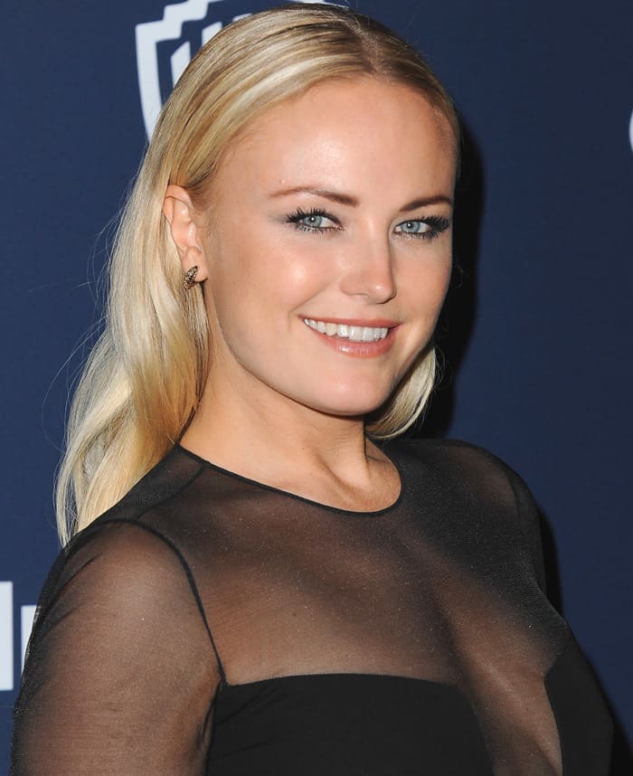 Malin Akerman styled her black sheer-effect Ralph Rucci gown with sleek, long blonde hair swept behind her shoulders and a radiant, natural makeup look for the Golden Globe Awards post-party