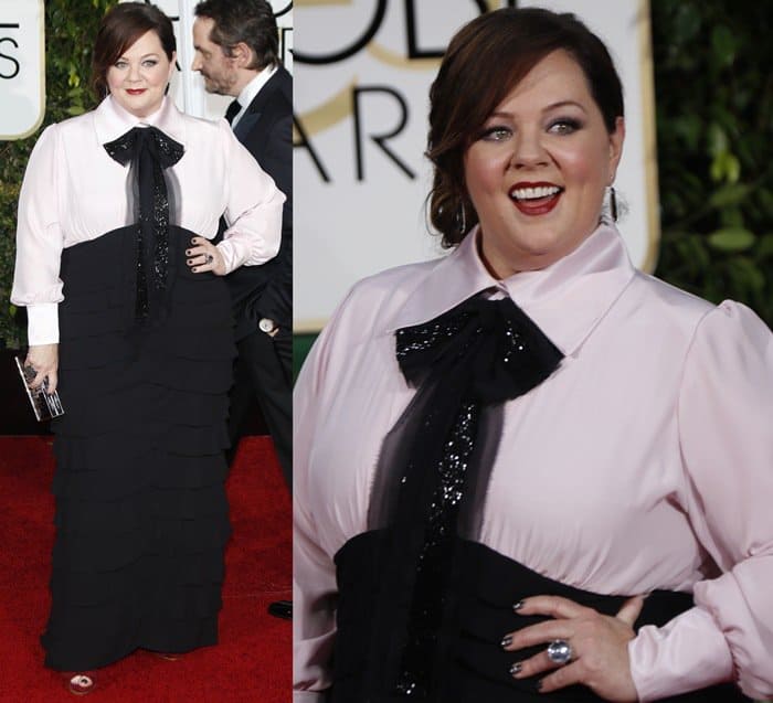 Melissa McCarthy wears a self-designed masculine black and white gown featuring an oversized bow at the 72nd Annual Golden Globe Awards
