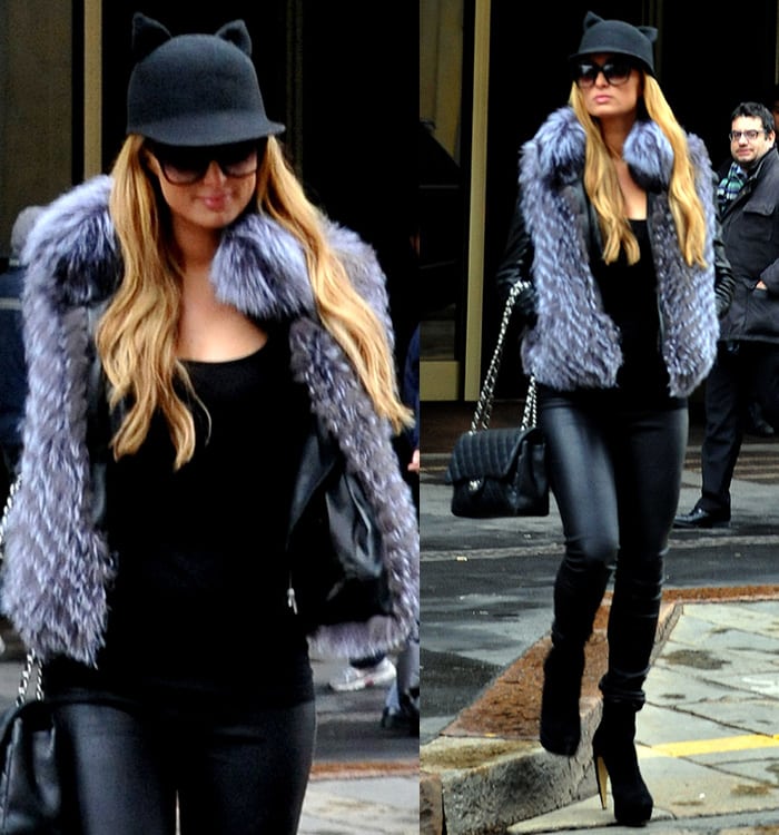 Paris Hilton wears Rag & Bone leather pants with a quirky Helene Berman cat ears cap in Milan