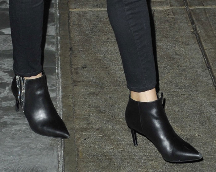 Reese Witherspoon wearing double-zipper Saint Laurent boots