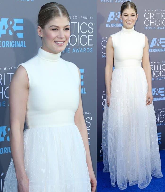 Rosamund Pike at the 2015 Critics' Choice Movie Awards in an ivory Valentino gown, which critics felt lacked color and vibrancy