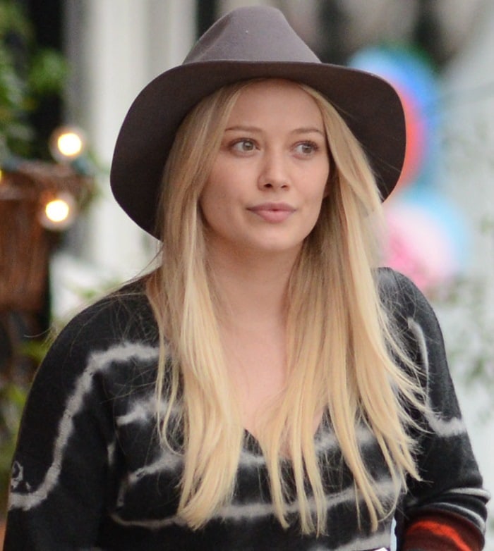 Hilary Duff exudes effortless style in a chic wide-brimmed felt hat