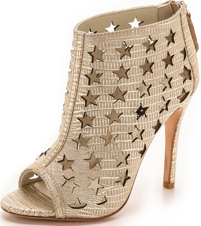 A soft metallic wash accentuates the lizard-embossed texture on nubuck booties