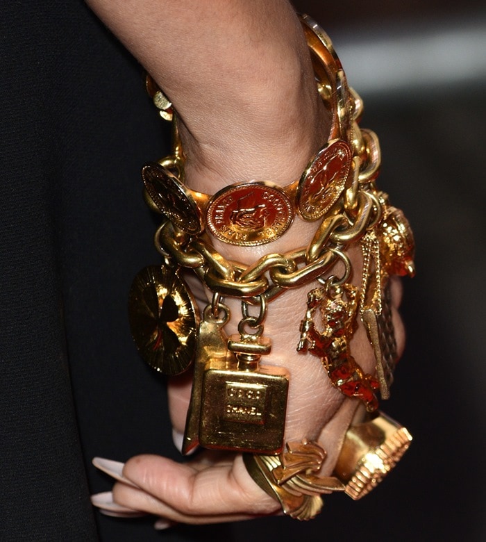 Alesha Dixon's vintage gold Chanel jewelry and Maria Piana rings