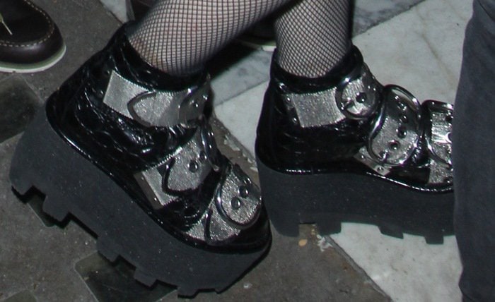 Madonna's feet in silver-buckled Alexander Wang creeper boots