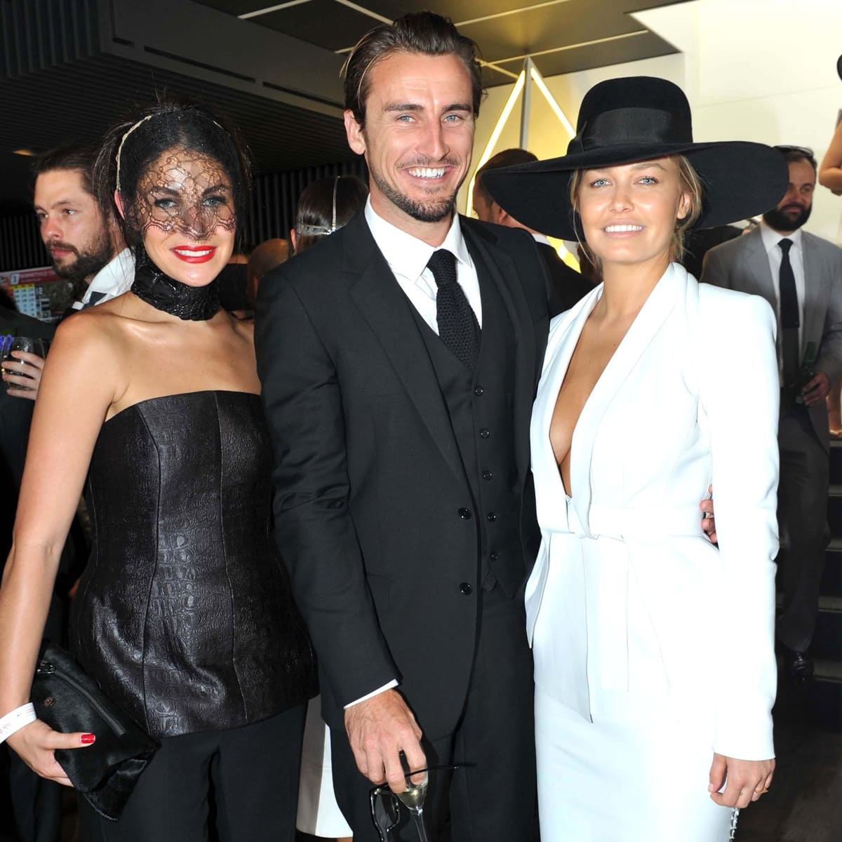 Camilla and Marc's co-founder Camilla Freeman-Topper (L) pictured with Gareth Moody and Lara Bingle