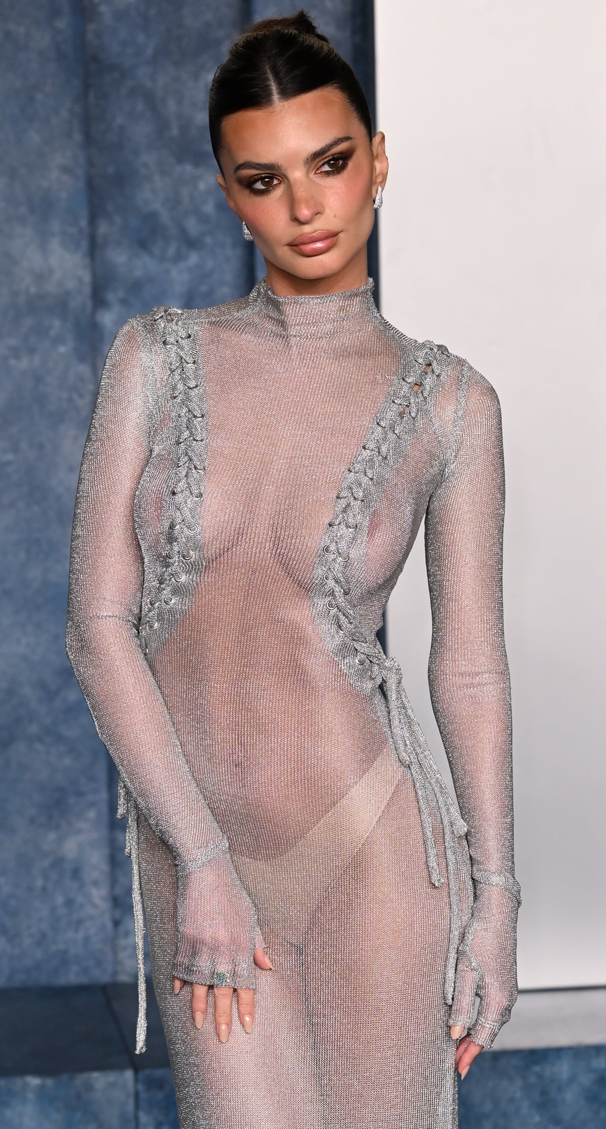 Emily Ratajkowski made heads turn in a completely sheer gown at the 2023 Vanity Fair Oscar Party
