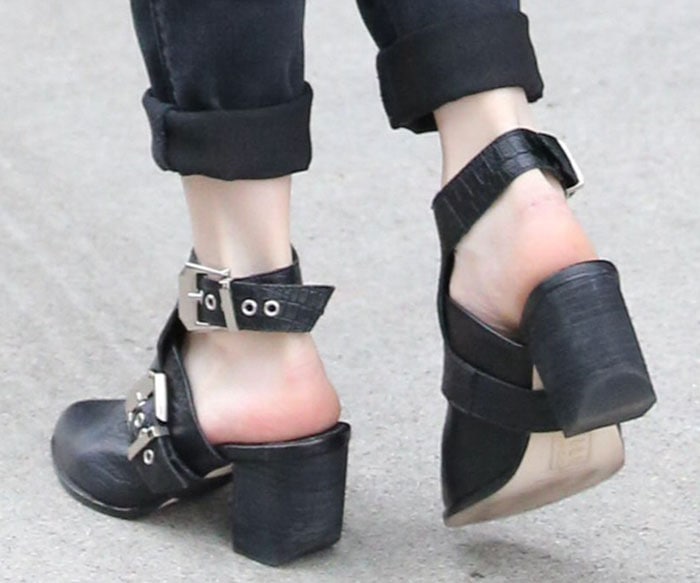 Emma Roberts shows off her feet in a hybrid between mules and booties