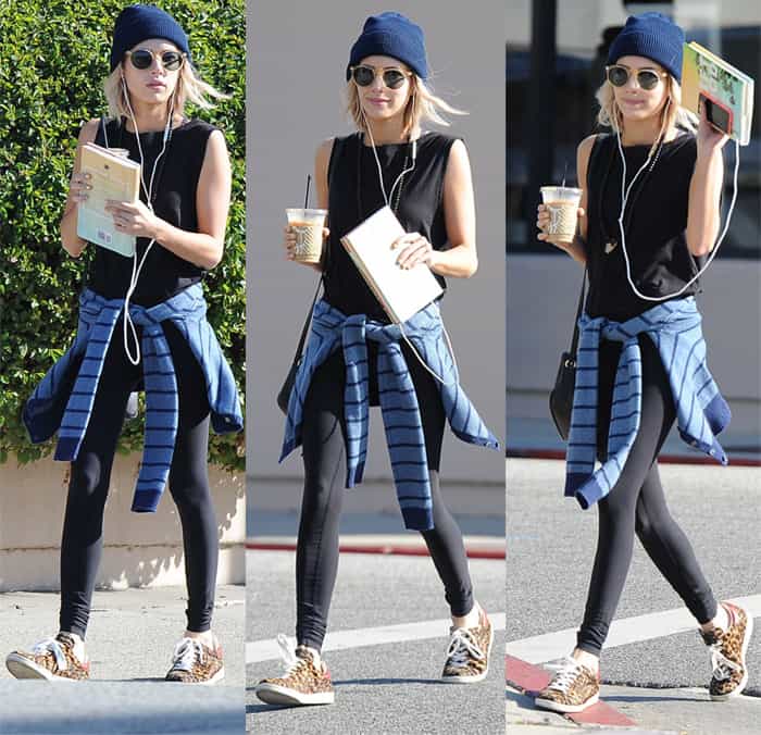 Emma Roberts in beanie and animal print sneakers