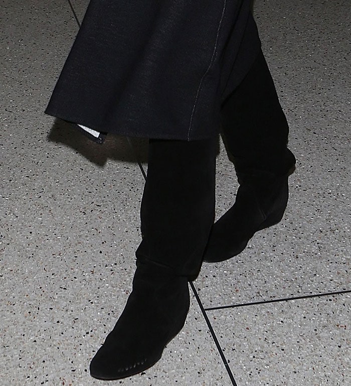 Heidi Klum wearing Saint Laurent knee-high boots