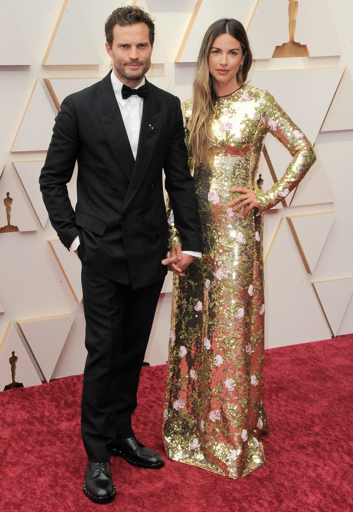 Jamie Dornan and his wife Amelia Warner attend the 94th Annual Academy Awards