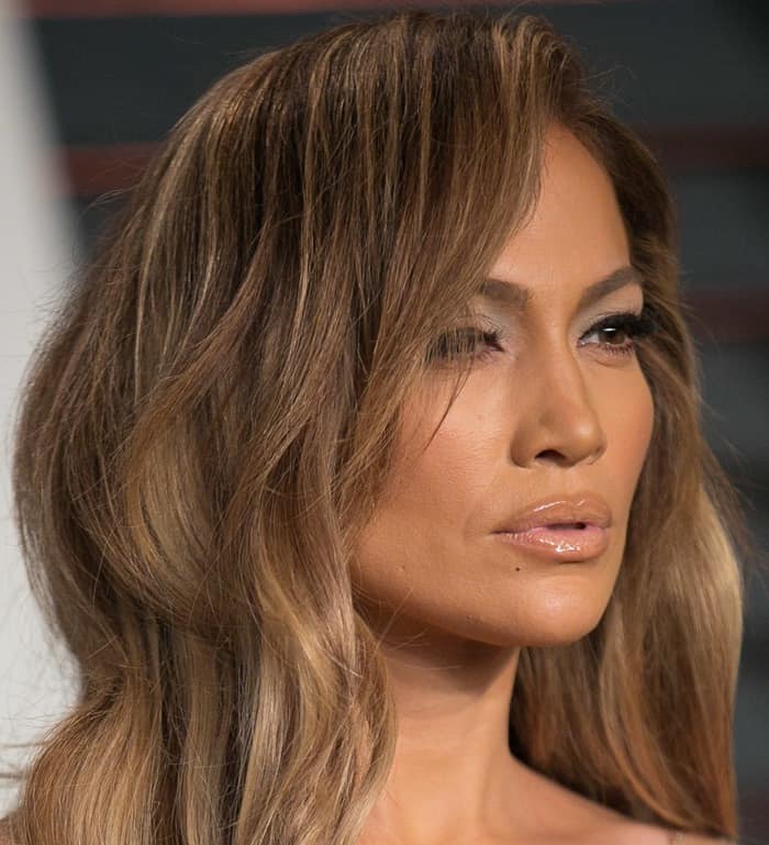 Jennifer Lopez made a slightly exaggerated pouty face as if reacting to something surprising or amusing