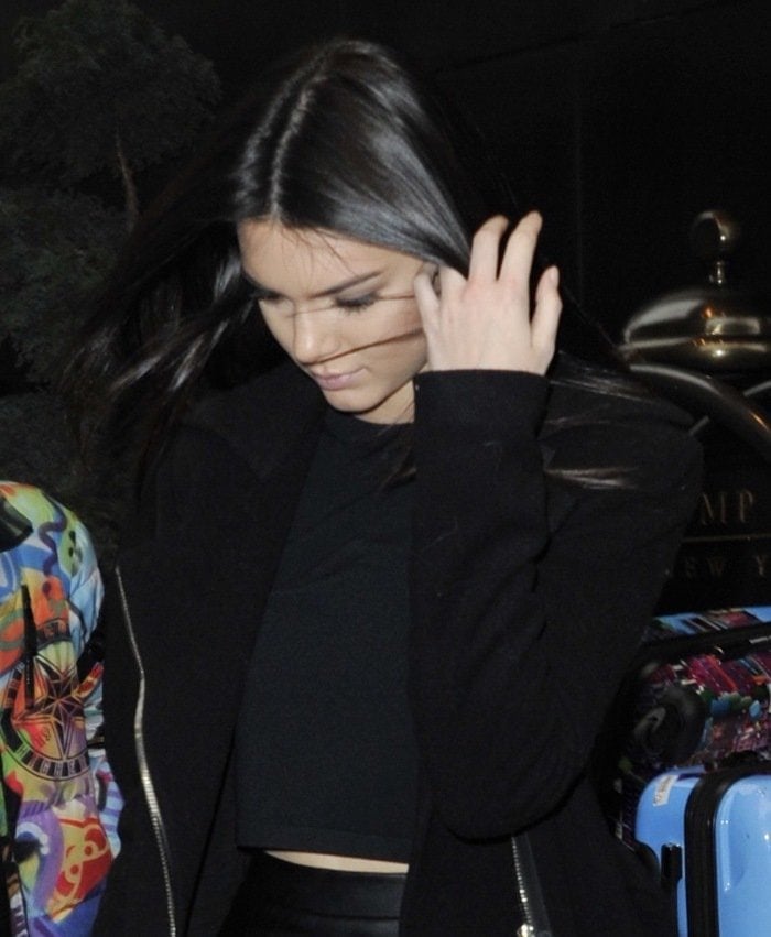 Kendall Jenner wears a black crop top