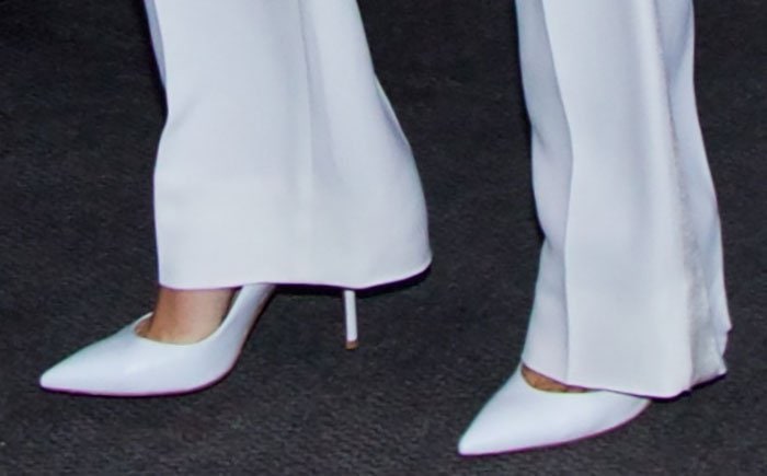 Khloe Kardashian wearing white Gianvito Rossi pumps