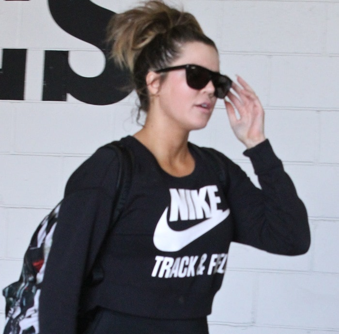 Khloé Kardashian's black crop-top crew neck sweatshirt by Nike