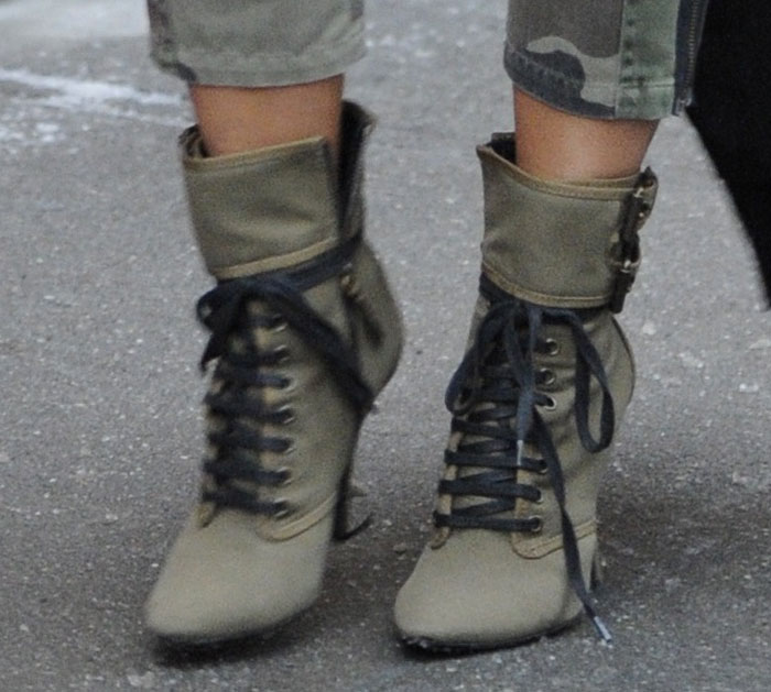 Kim Kardashian's olive green canvas boots