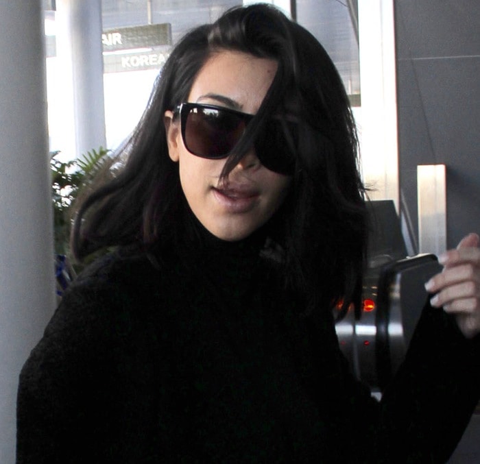 Kim Kardashian's dark Yves Saint Laurent sunglasses