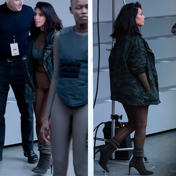 Kim Kardashian surveying the premises before the start of the Yeezy fashion show
