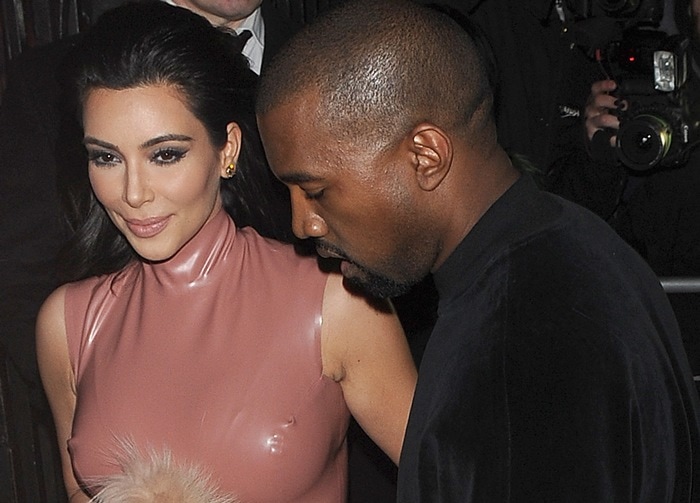 Kanye West and Kim Kardashian leaving the Dorchester hotel with husband Kanye West on February 26, 2015