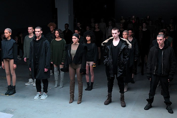 Kylie Jenner standing with other models at the Adidas Originals x Kanye West Yeezy fashion show