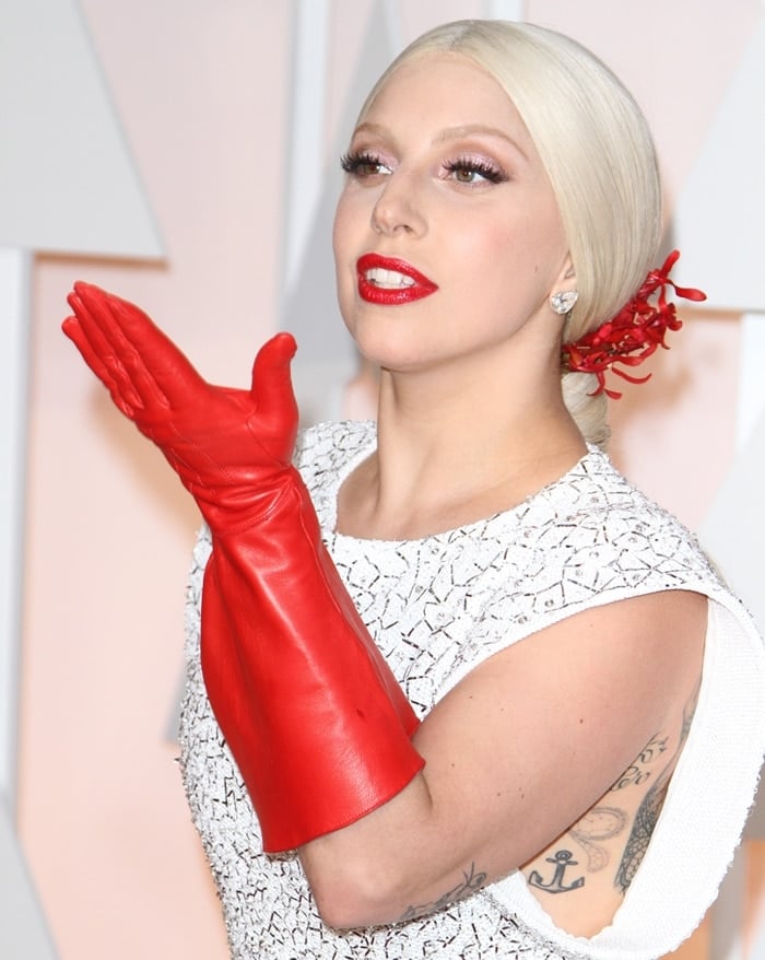 Lady Gaga's elbow-length red leather dishwasher gloves