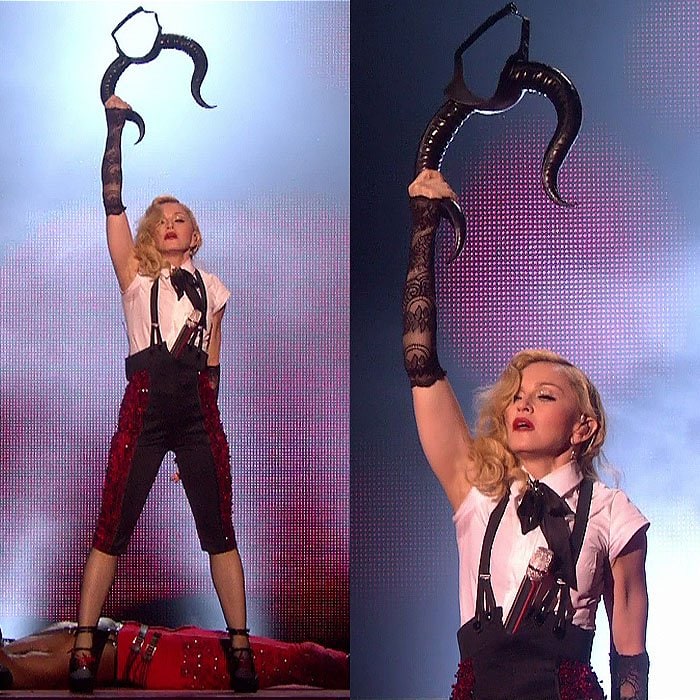 Madonna continuing with and finishing her BRIT Awards performance like a true professional