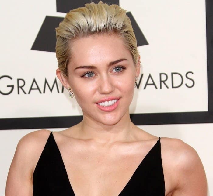 Dolly Parton's goddaughter Miley Cyrus shows off her Lorraine Schwartz jewelry