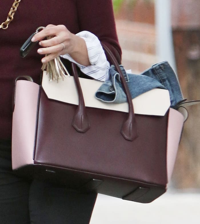 Reese Witherspoon effortlessly carries the versatile and stylish Bally Sommet tote bag