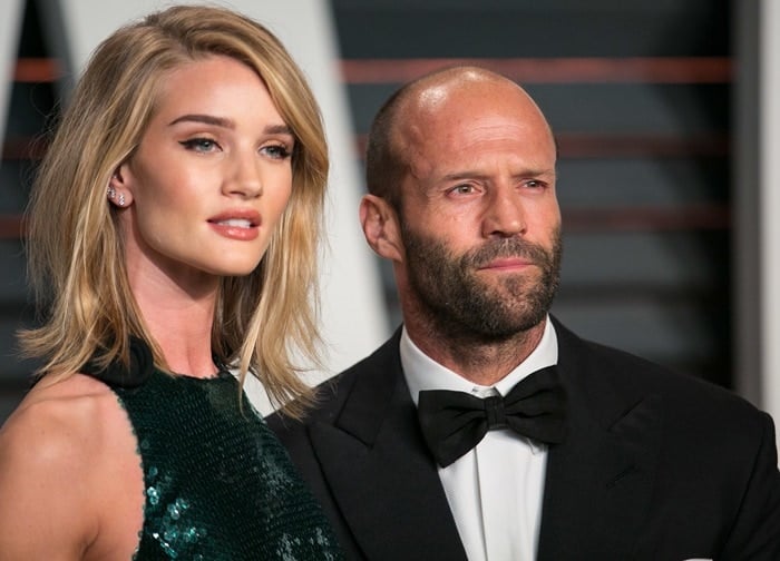 Jason Statham wrapped his arm around Rosie Huntington-Whiteley at the 2015 Vanity Fair Oscar Party held during the 2015 Oscars in Beverly Hills on February 22, 2015