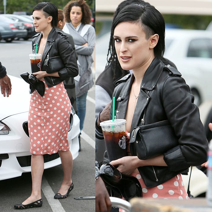 Rumer Willis carrying a Starbucks drink and Sergio Rossi shoes in her hand as she makes her way to the "Extra" studios