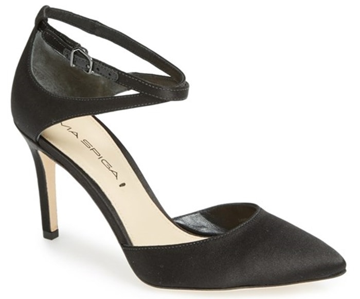 Slim ankle straps and a gracefully pointed toe intensify the modern glamour of a classic single-sole pump