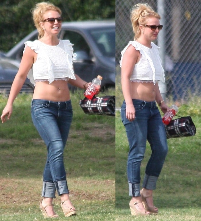 Britney Spears showed off her abs in a white crop top and blue jeans