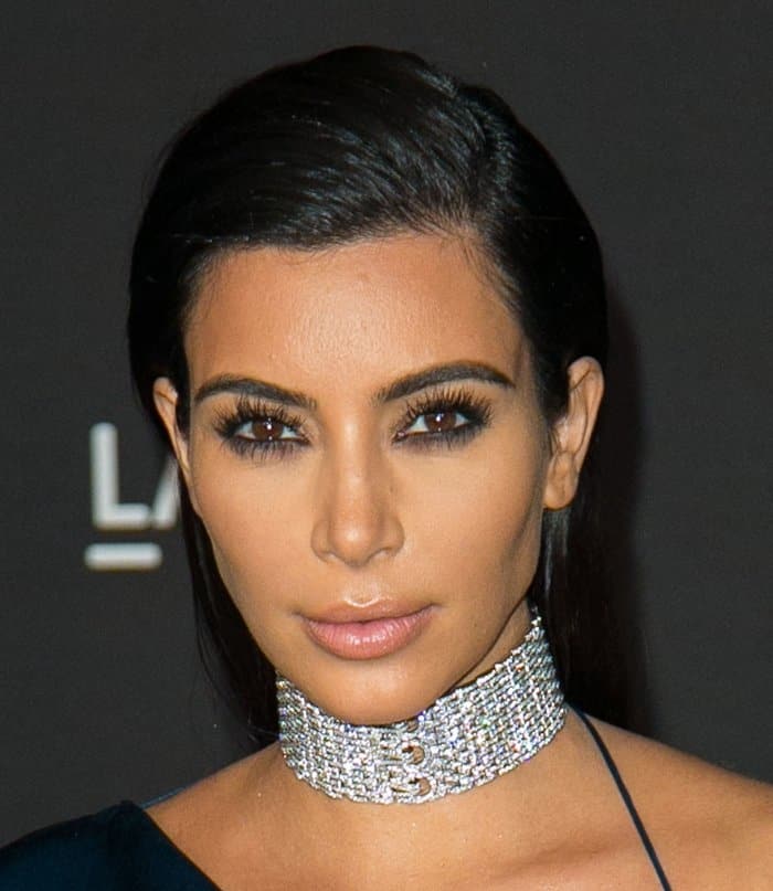 Kim Kardashian shows off her diamond Cartier choker necklace