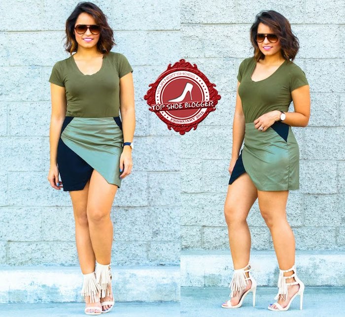 Claudia wearing an army green outfit