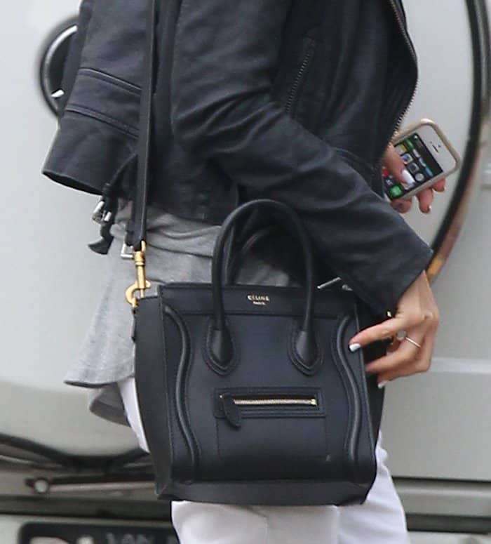 Ashley Tisdale carries a black Celine Nano crossbody bag