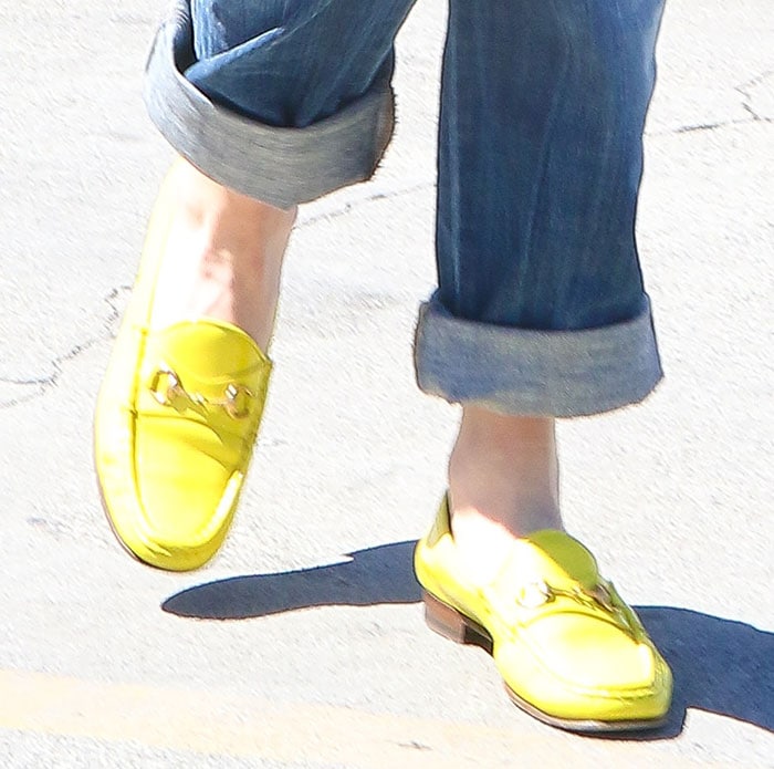 Gwen Stefani wearing yellow patent Gucci loafers