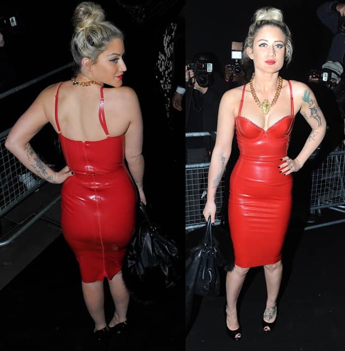 Katie Waissel shows off her cleavage in a figure-hugging red latex dress