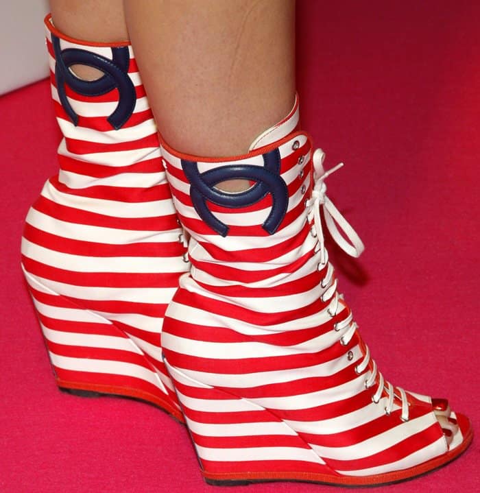 Katy Perry shows off her candy-striped boots