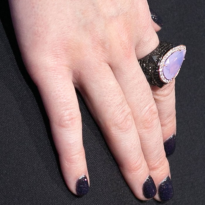 Katy Perry's faceted lilac stone ring and sparkly dark purple nails