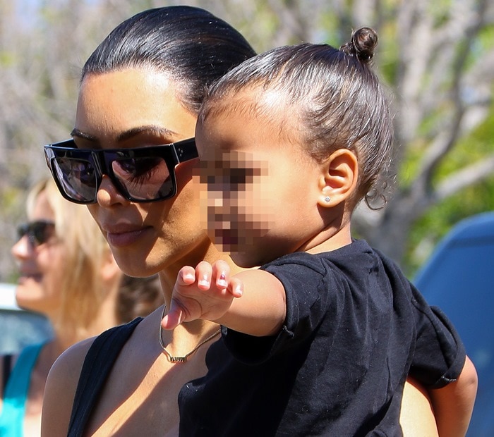 Kim Kardashian and North West leave a movie theatre in Calabasas after watching 'Cinderella' on March 28, 2015