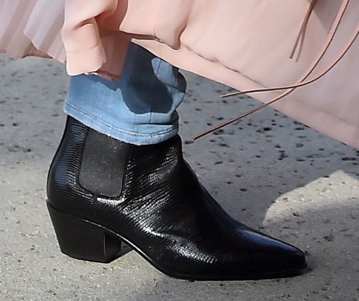 Kourtney Kardashian wearing Saint Laurent boots