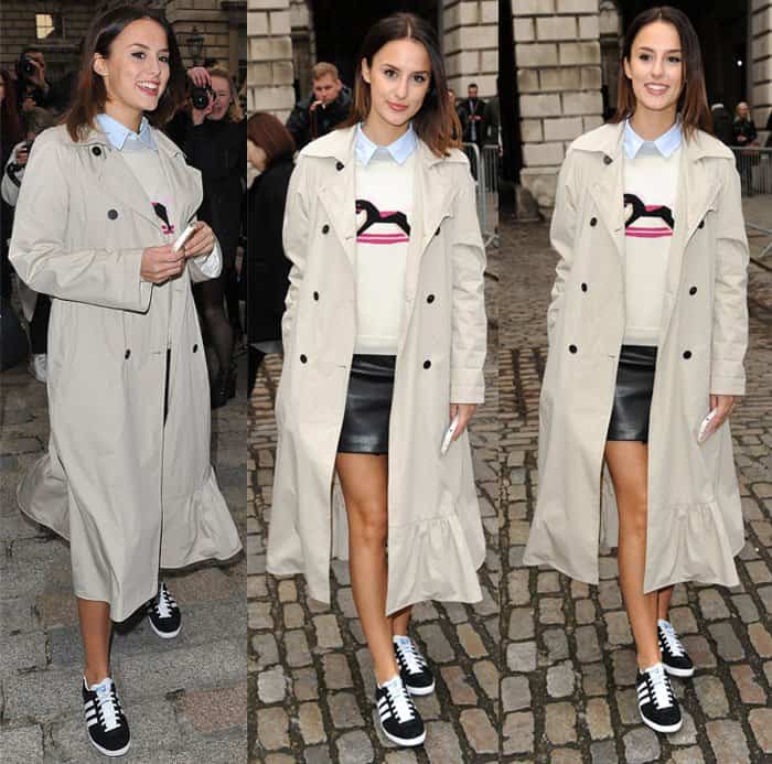 Sporty Edge: Lucy Watson opts for sneakers with her mini skirt, adding a casual vibe to her ensemble at London Fashion Week A/W 2015