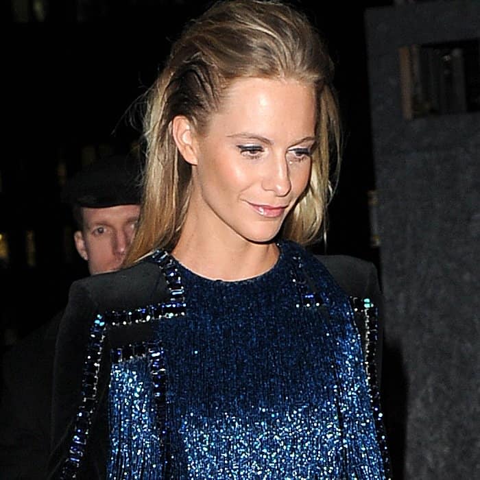 Poppy Delevingne styled her sleek hair with a metallic blue fringed Balmain dress