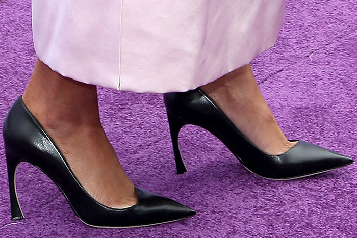 Rihanna's feet in Christian Dior pumps with low-cut vamp edges and flare heels