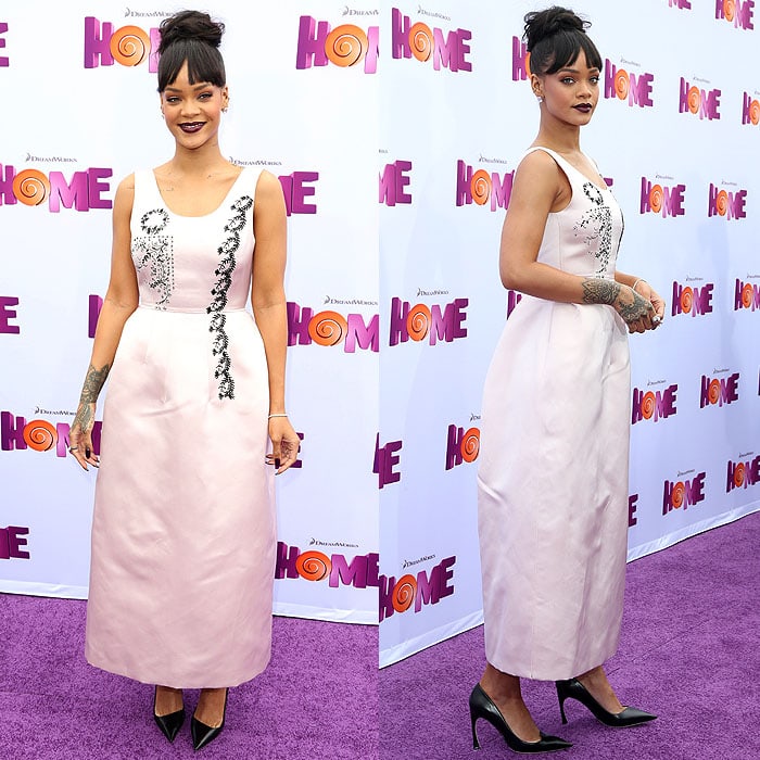 Rihanna in a pale pink Christian Dior sleeveless gown with a bell-shaped ankle-length skirt and black embroidery