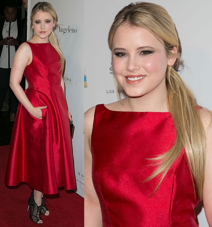 Taylor Spreitler flashed her legs in a flowing red satin sleeveless dress