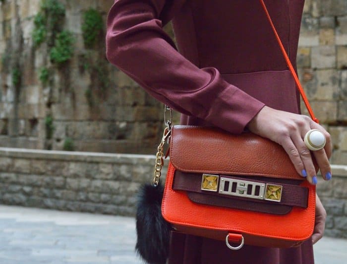 Isabelle carries a colorblock purse from Proenza Schouler's signature PS11 family