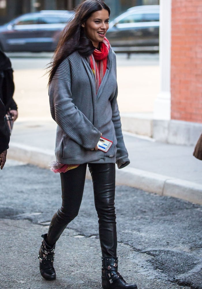 Adriana Lima later changed into a pair of black boots